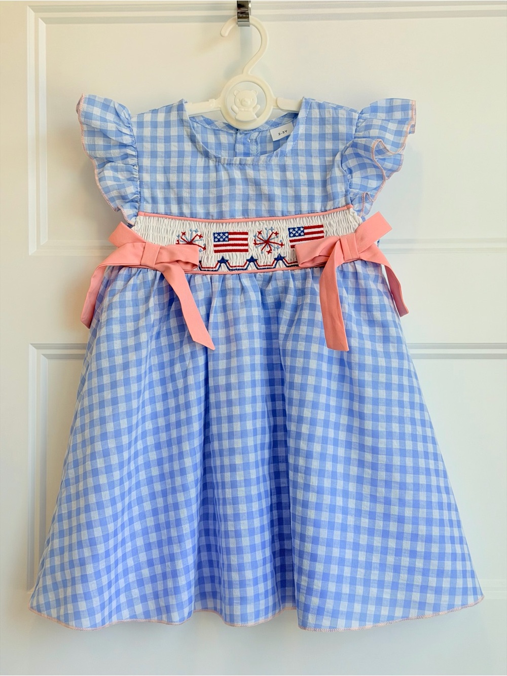 Girls' Blue Gingham Smocked Dress with Pink Bow Accents